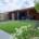 Moderne, onderhoudsvrije tuin met kunstgras in Udenhout